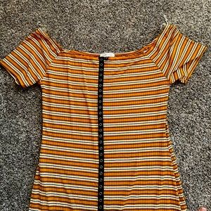 Body hugging fun print dress. Never worn